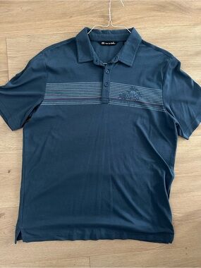 Travis Mathew Navy Polo with Horizontal Stripe Accent